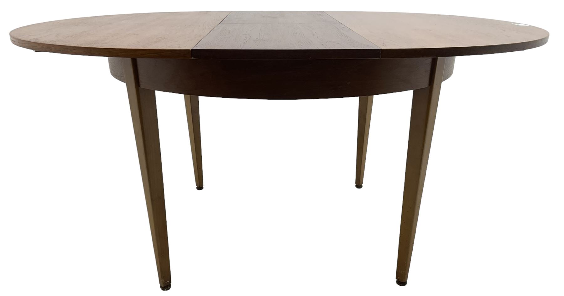 G-Plan - mid-20th century teak extending circular dining table, with concealed additional leaf (W114cm, H72cm); and a set of four mid-20th century teak dining chairs, seat upholstered in beige fabric