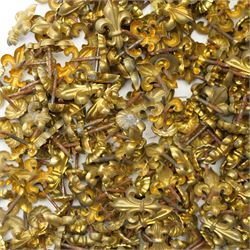 Large quantity of Victorian brass upholstery pins with rosette and fleur de lis designs 
Provenance: property of a Nobleman