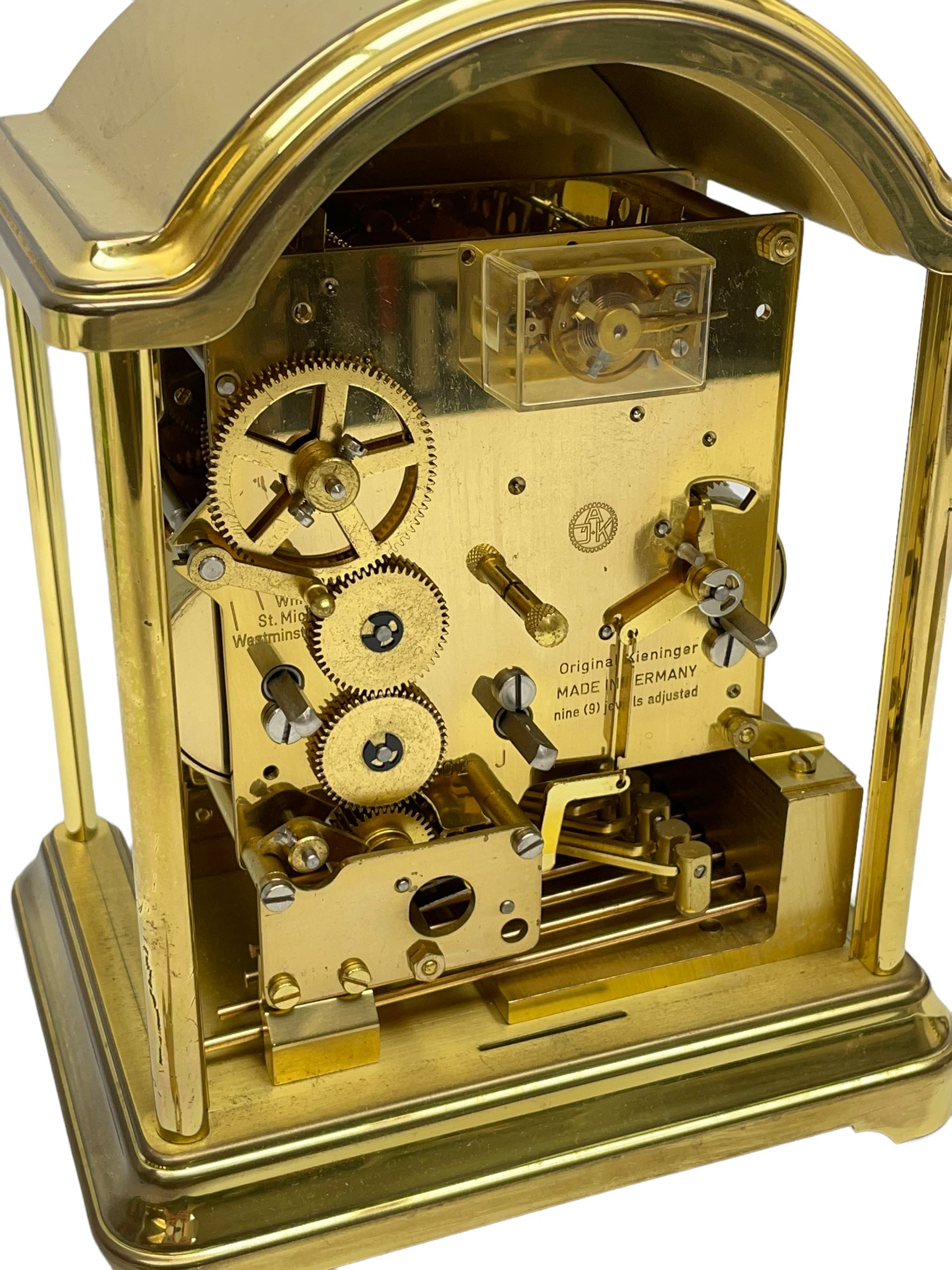 A 20th century brass cased Kieninger (German) chiming mantle clock with