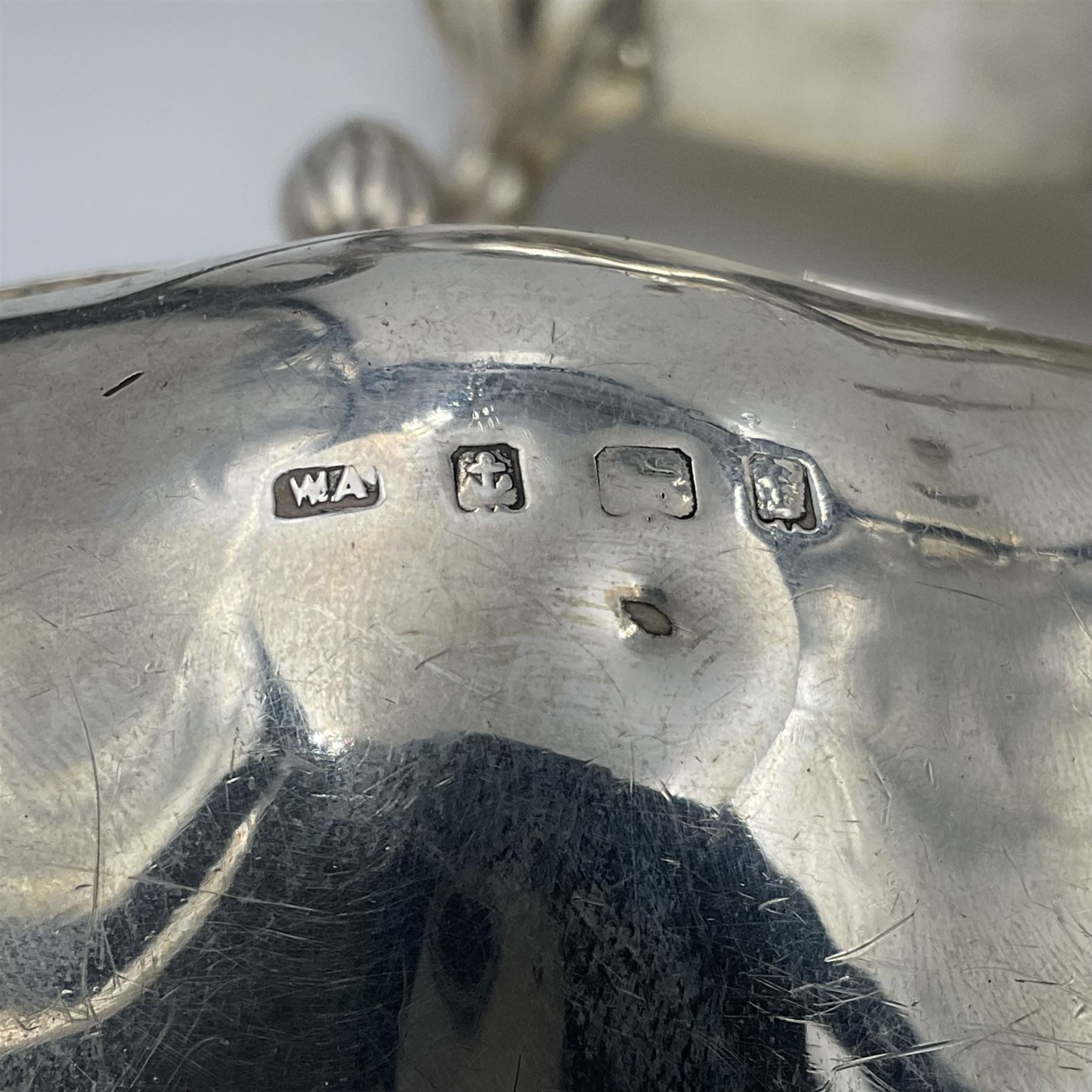 Five piece Edwardian silver tea service, comprising teapot and coffee pot, each with ebonised scroll handle, tea caddy with hinged cover, twin handled open sucrier, and milk jug, each of rounded bombe form, upon four paw feet, hallmarked William Adams Ltd, Birmingham 1904 and 1905, coffee pot H26cm
