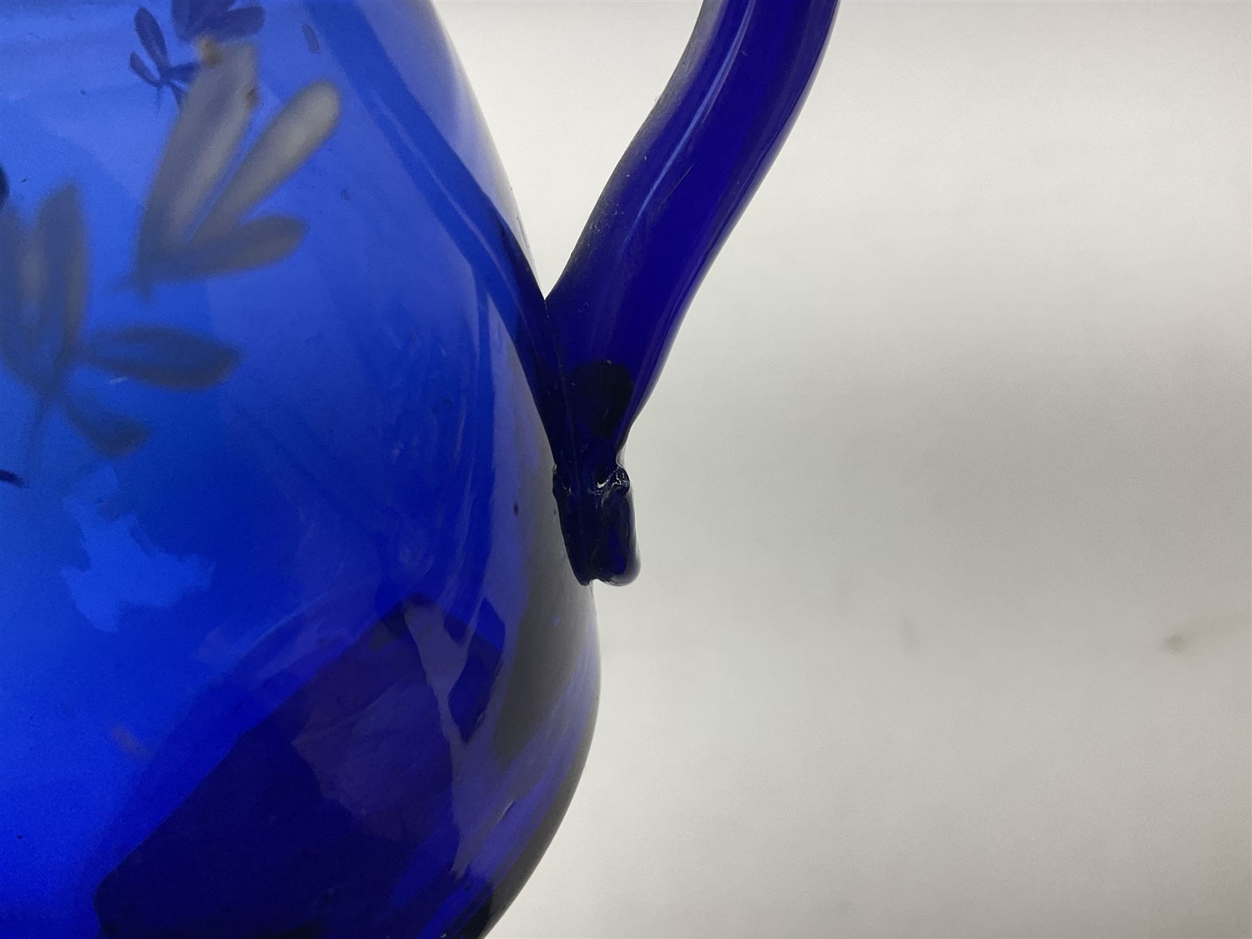 Pair of Victorian cobalt blue glass cups with gilt and painted decoration, entitled Hope's the Balm of Life and Love me as I Love Thee, H8.5cm