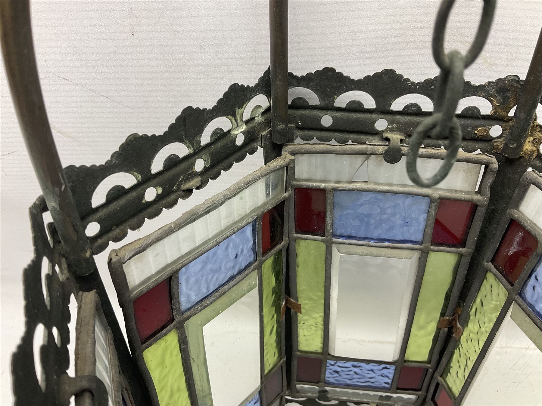 Victorian brass and stained leaded glass hall lantern, of hexagonal form, supported by four domed arms and pierced fret, H46cm W20cm