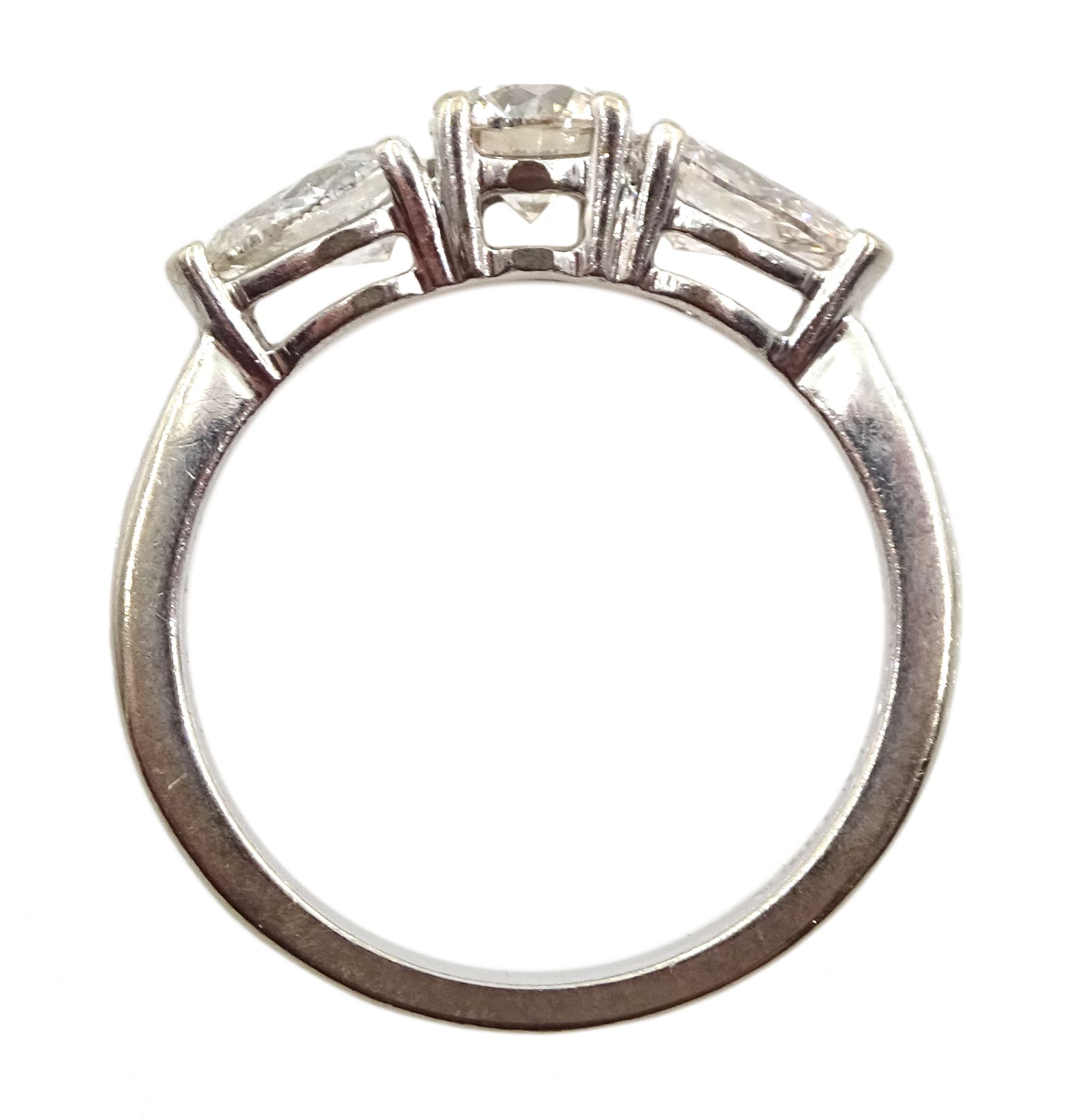 18ct white gold three stone diamond ring, central round brilliant cut diamond with two pear shaped diamonds either side, hallmarked, total diamond weight 1.48 carat