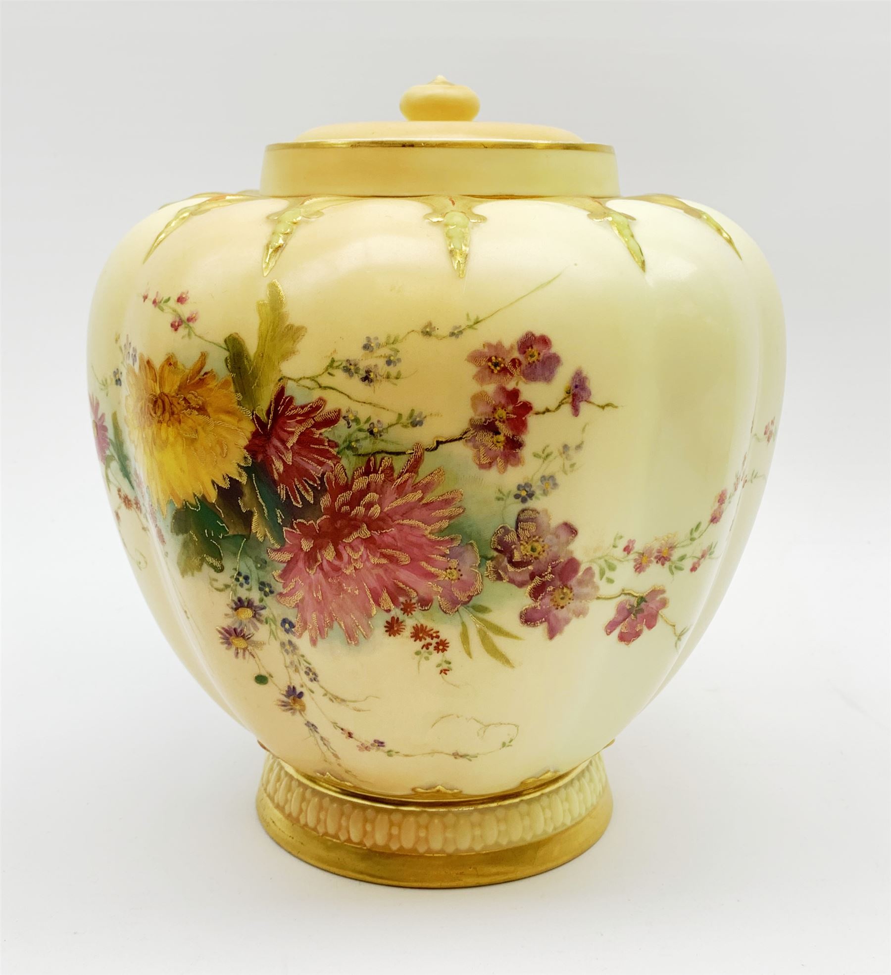 A Royal Worcester blush ivory potpourri jar and cover, of lobed form decorated with floral sprays and heightened with gilt, with printed marks beneath, RdNo112589, shape 1312, overall H19.5cm.