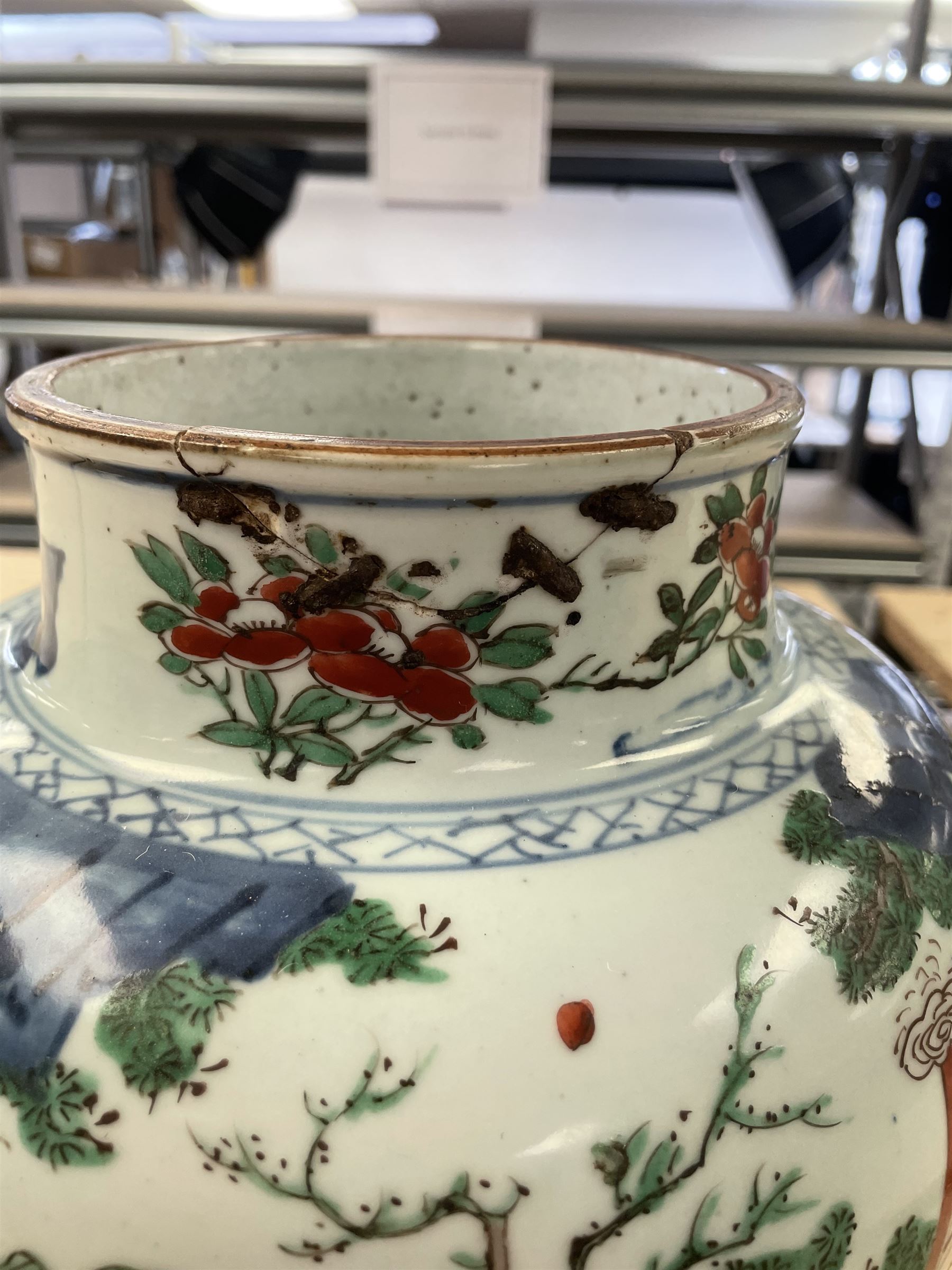 17th century Transitional period Chinese Wucai vase and cover, of baluster form, the body painted with ladies upon a terrace, and figures upon horseback and attendants within a fenced garden, the domed cover with knop finial painted with boys at play, H37cm
