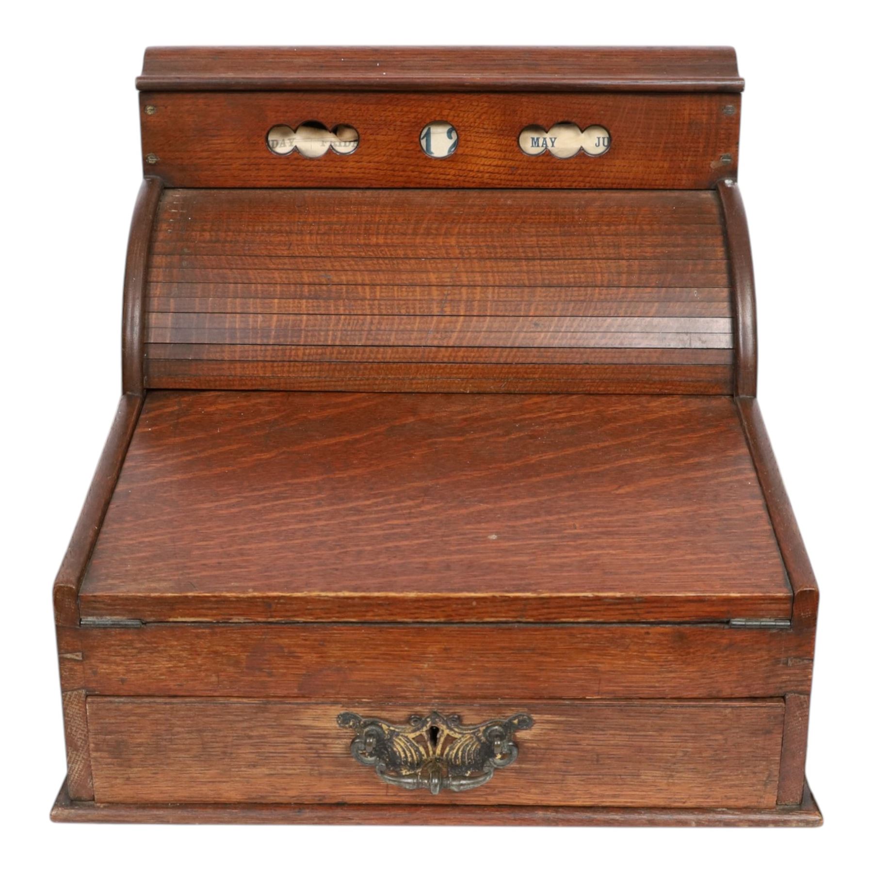 Victorian oak perpetual calendar roll-top desk, tambour front enclosing fitted interior with pigeonholes and pen trays, the raised back fitted with rotating date and month apertures, over single frieze drawer with cast brass handle, on plinth base