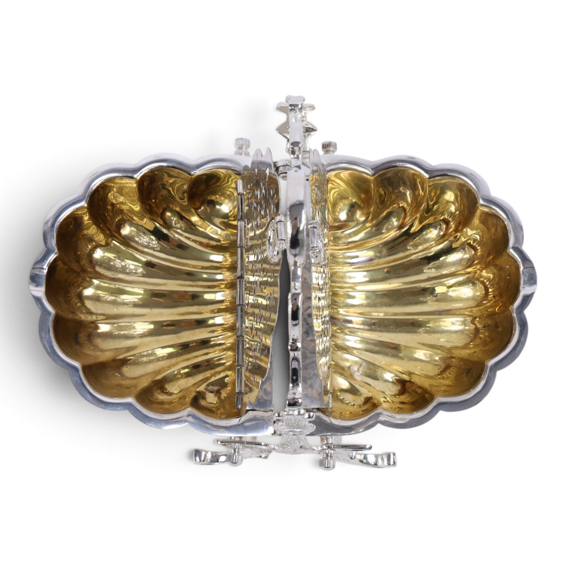 Silver-plated Victorian style biscuit box, in a shell form with engraved leaf detailing, upon scroll feet, H24cm