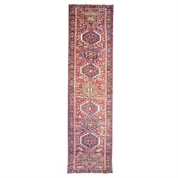 North West Persian Karajeh hand-knotted runner, ivory field decorated with a series of lin...