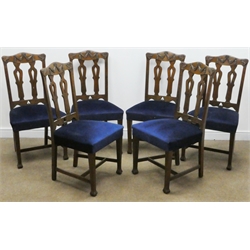  Set eight (6+2) continental style oak dining chairs, swag and leaf carved cresting rail, pierced splat, upholstered seat, square tapering supports, W60cm  