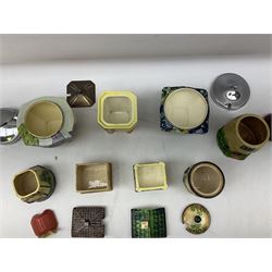 Collection of Japanese Maruhon ware novelty preserve pots, to include examples modelled as a windmill and cottages, together with other 1920s and 30s Art Deco style preserve pots, etc