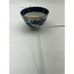 Pair of Staffordshire figures modelled as chained Dalmatians seated upon cobalt blue oval bases, H13cm, together with a Staffordshire pastille burner modelled as a castle, H12cm, a pair of 19th century Derby potpourri pots (lacking covers), and an 18th century blue and white tea bowl 