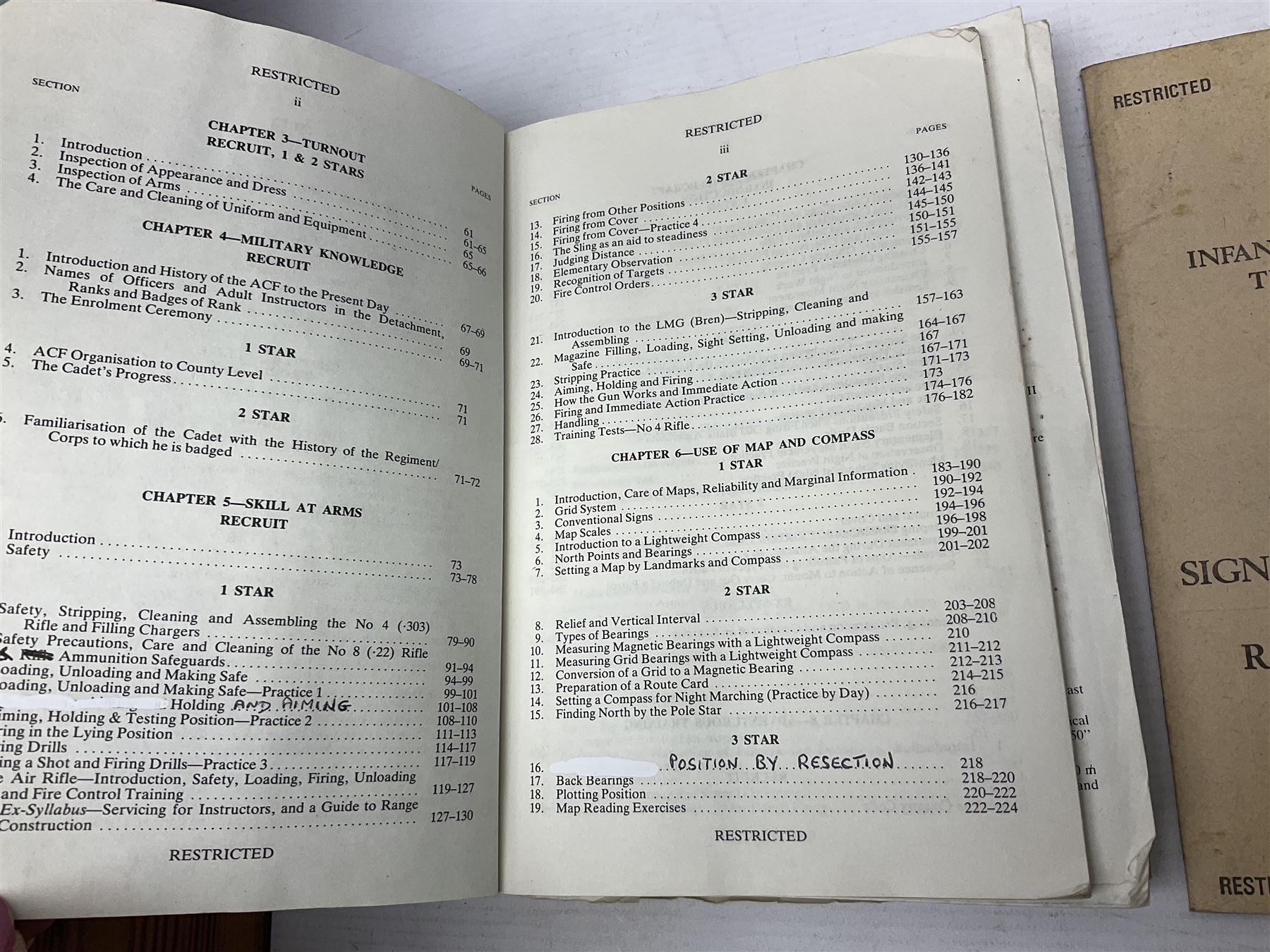 Collection of nineteen British Army booklets 1940s - 1970s including Small Arms Training 1944, various Infantry Training, Cadet Training Manual 1978, Signal Training, Commander's Aide Memoires etc; 1950s blue beret with Yorks Brigade badge; part travelling toilet set in cloth roll; all contained in pine box with webbing straps