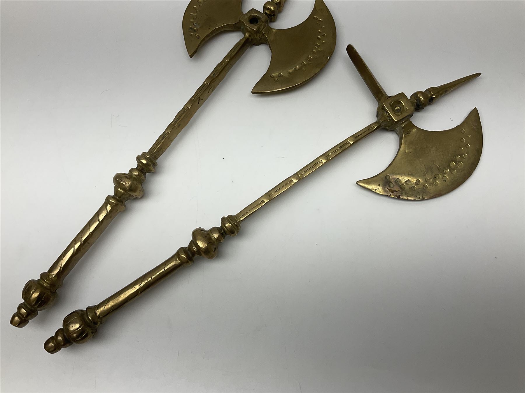 Ornamental cast-brass double-headed axe, together with another similar, H44cm