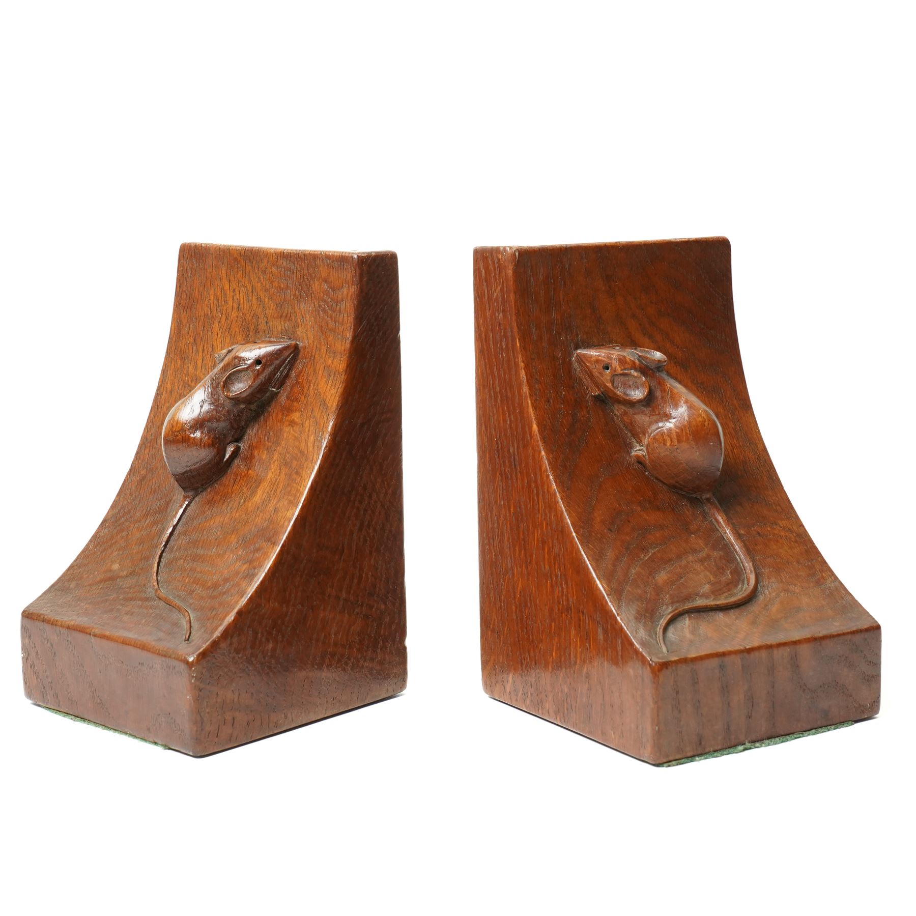 Mouseman - pair of circa 1940s/50s oak bookends, good colour, with carved mouse signatures forming a heart shape when side by side, by Robert Thompson of Kilburn