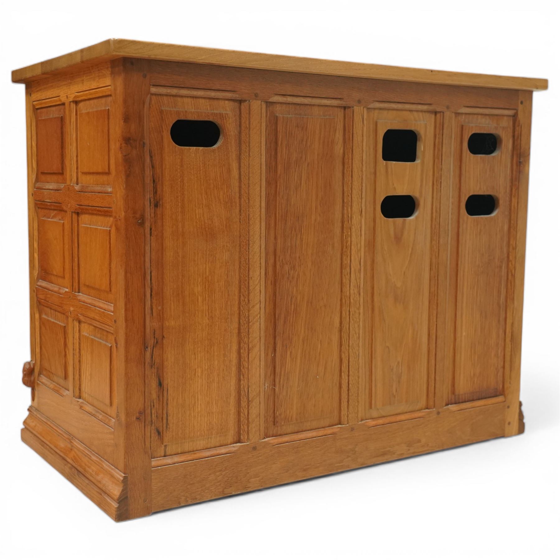  Beaverman - oak media cabinet, rectangular top with interictally carved panels to the side and front doors, twin doors with Yorkshire Rose carved wooden knob, enclosing a staggered shelf arrangement above two drawers, raised on a moulded plinth base, with carved beaver signature, by Colin Almack of Sutton near Thirsk