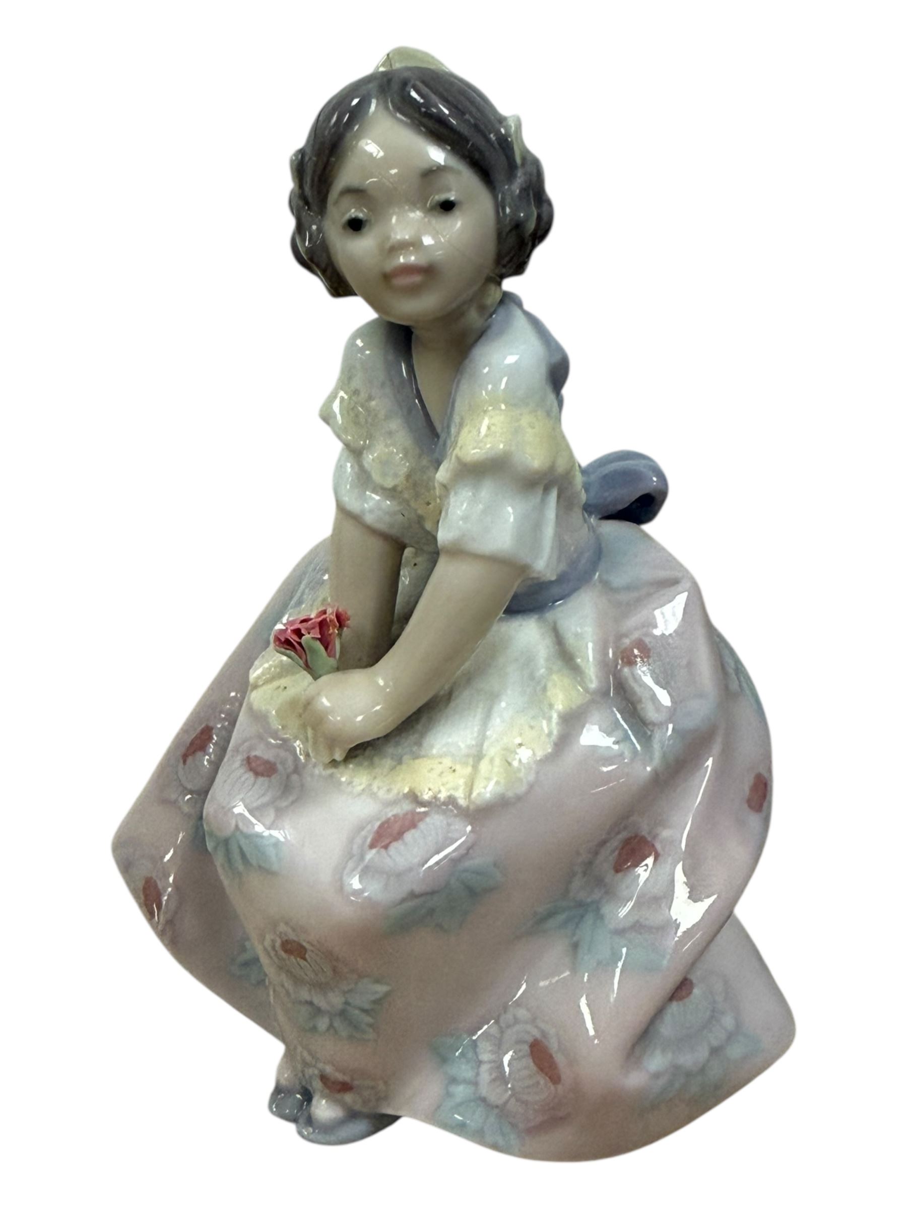 Three Lladro figures, Bashful Bather 5455, Pepita no 5372 and girl with lamb no 1010, together with two Neo figures and a Royal Doulton figure 