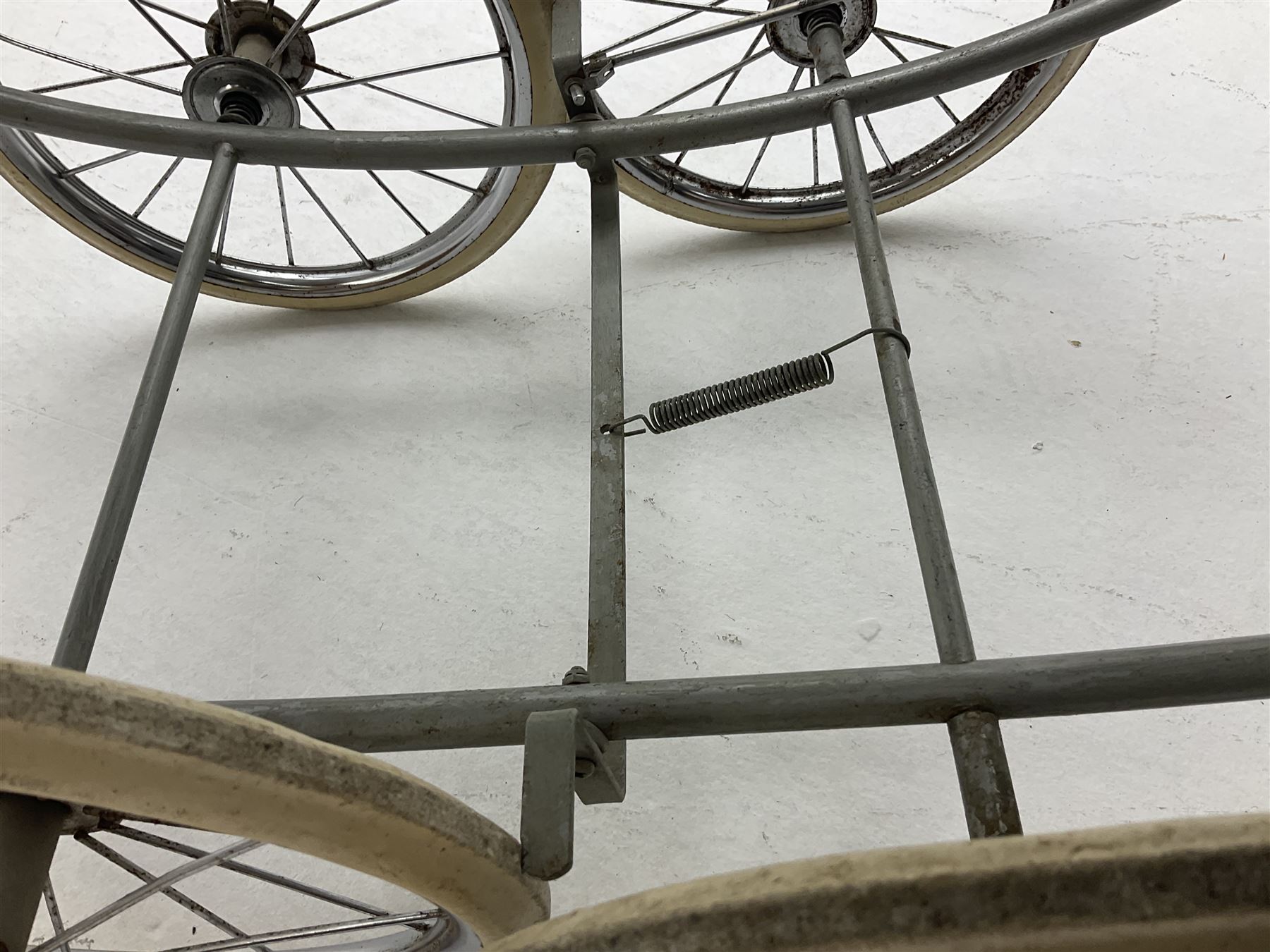 Silver Cross coach-built doll's pram with green fold-down hood and cover, sprung tubular frame, chrome and white handle, four spoked wheels with brake, mattress, pillow and bedding L97cm