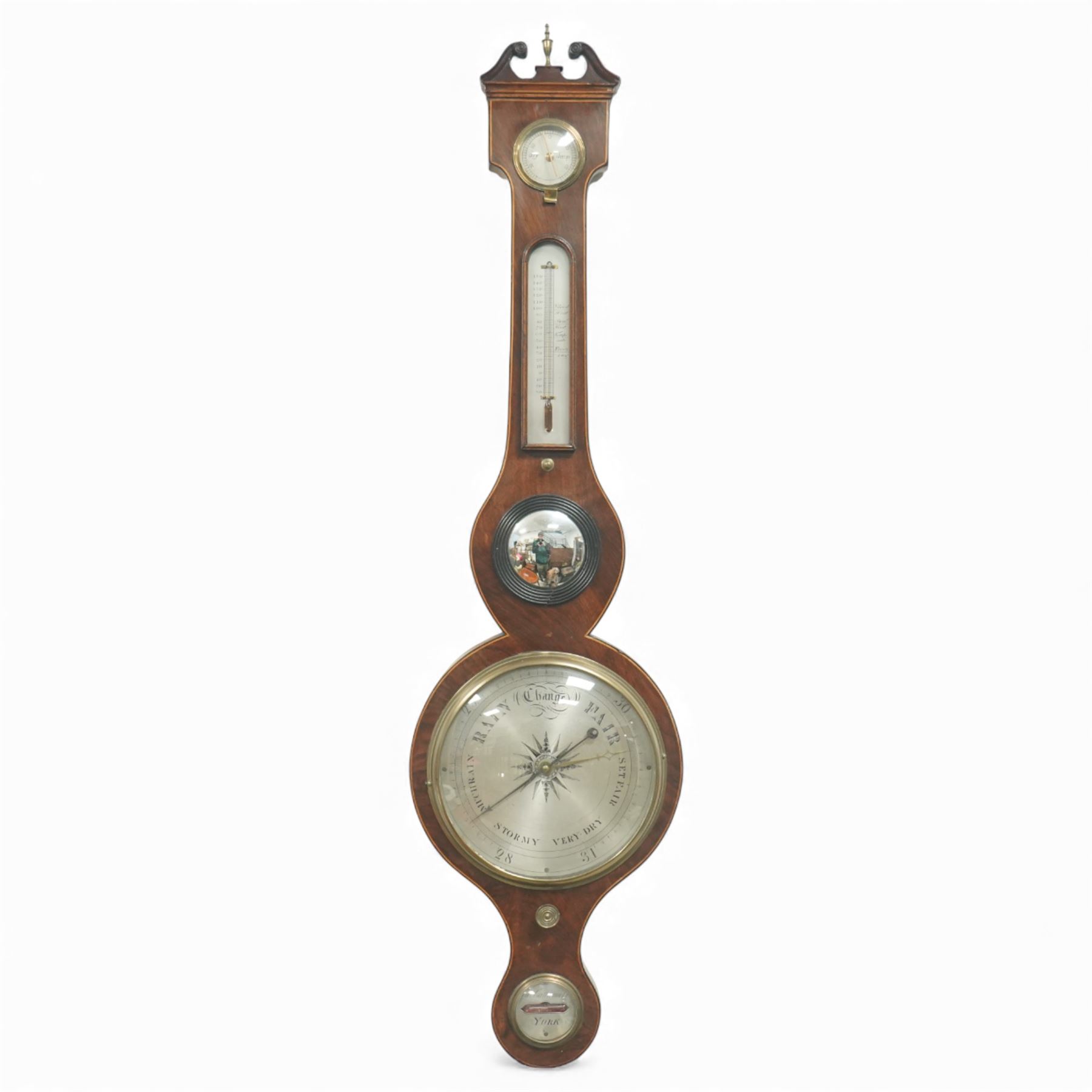 John Cattermole of York - early 19th-century wheel-barometer,  in a mahogany case with a break arch pediment, brass finial and rounded base, 8-inch silvered dial with predictions and recording barometric air pressure from 29-31 inches, steel indicating hand and brass recording hand, hydrometer, spirit bubble and boxed spirit thermometer