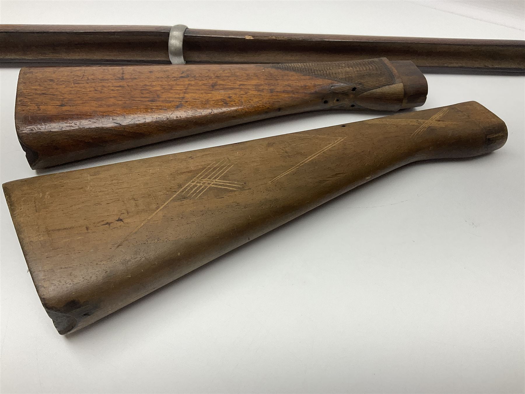 Quantity of spare parts for .577/450 Martini Henry rifle including two stocks, fore-end etc