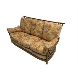 Ercol - 'Renaissance' three seat sofa, loose cushions upholstered in patterned fabric