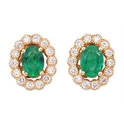 Pair of 14ct rose gold oval cut emerald and milgrain set, round brilliant cut diamond clus...