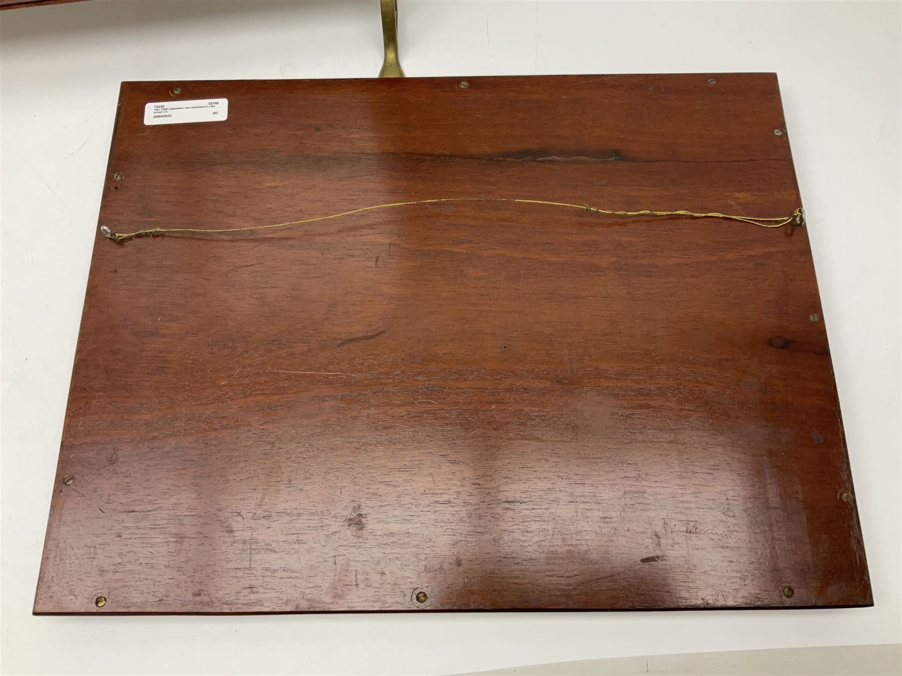 Two 1950s tapestries, the framed example celebrating the 1953 coronation, the second converted into a fire screen depicting a floral display, firescreen H70cm (2)