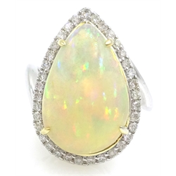  18ct white gold pear shaped opal and diamond cluster ring, stamped 750, opal 4.4 carat   