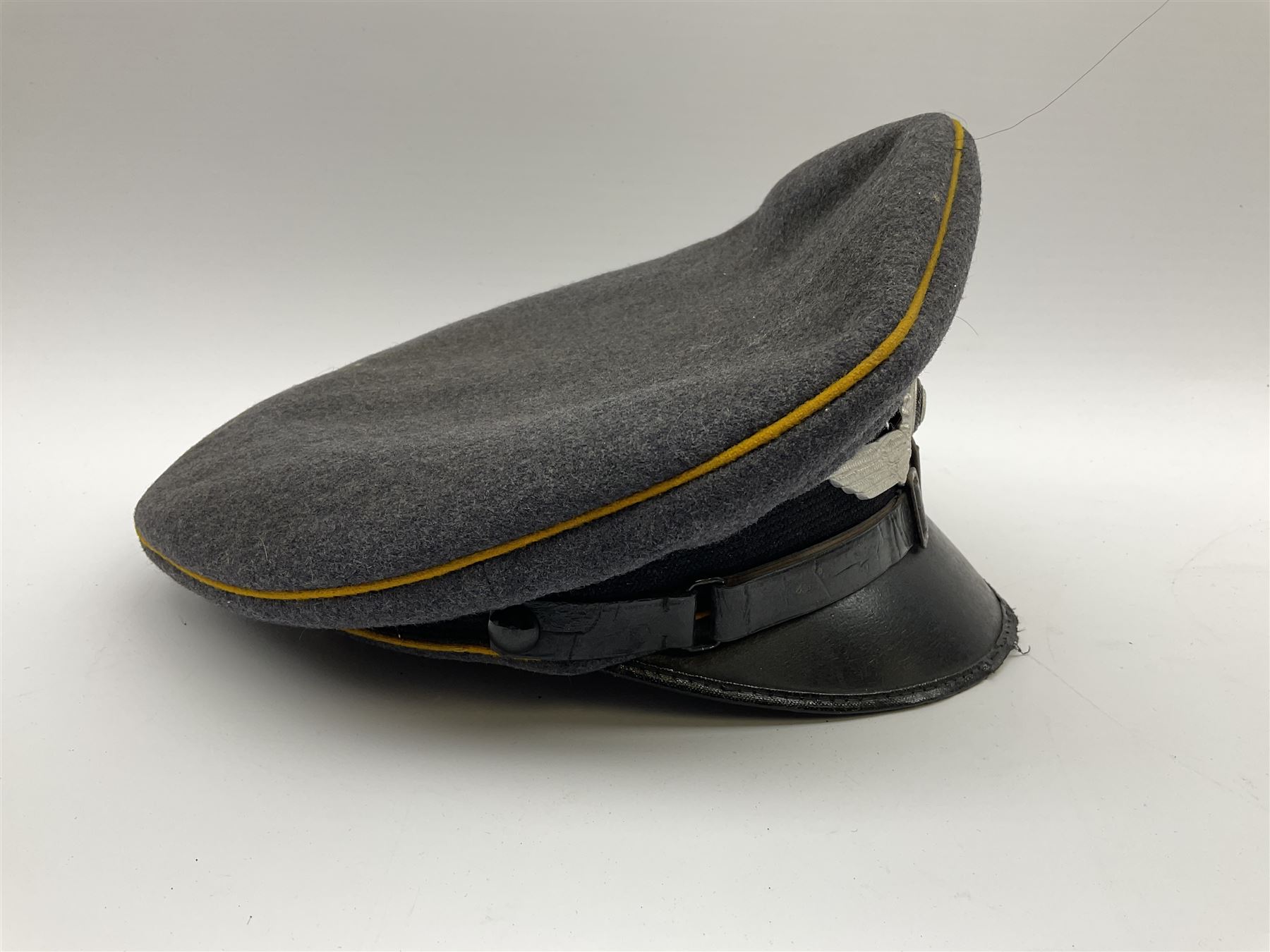 WW2 German Luftwaffe NCO grey cloth peaked cap, orange piping to the ...