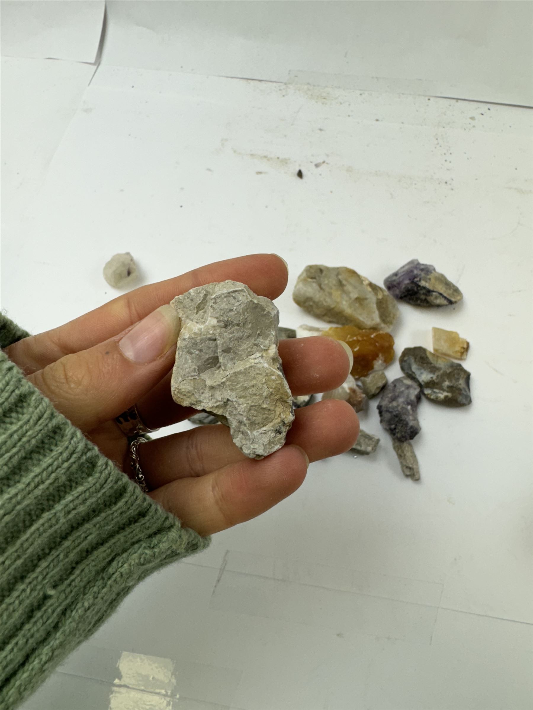 Collection of raw Blue John specimens, together with other mineral specimens