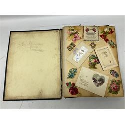 Victorian scrapbook of various fixed decoupage to include, greeting cards, portraiture, flowers, animals etc,