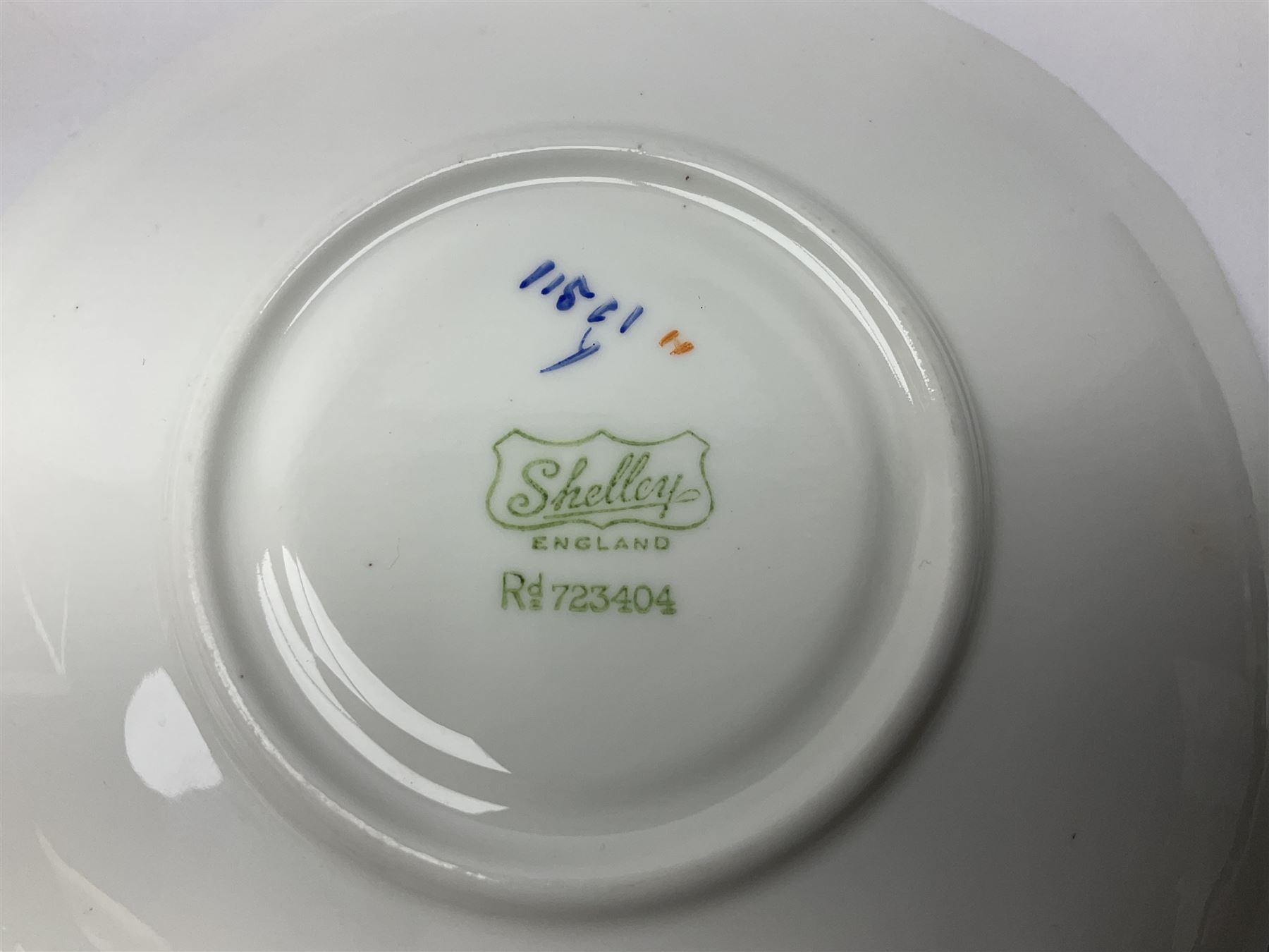 1920s Shelley Queen Anne shaped trio, decorated in the Blue Iris pattern no. 11561, ith printed mark beneath 