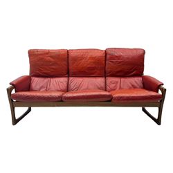 Folke Ohlsson for Gimson & Slater - mid-20th century Danish teak-framed sofa, red leather upholstery with patchwork design, raised on shaped teak side supports