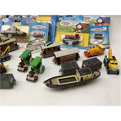 Ertl Thomas the Tank Engine and Friends die-cast models including carded Scrap Trevor, Slate Trucks, Neil, Wilbert, Sodor Taxi, Sodor Recovery Unit, Crane and four key rings; together with various uncarded models including locomotives, coal wagons, steam rollers, boat transporter, recovery units etc (over forty items)