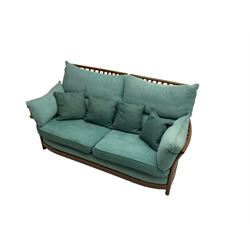 Ercol - 'Renaissance' large two seat sofa, loose cushions upholstered in teal fabric 