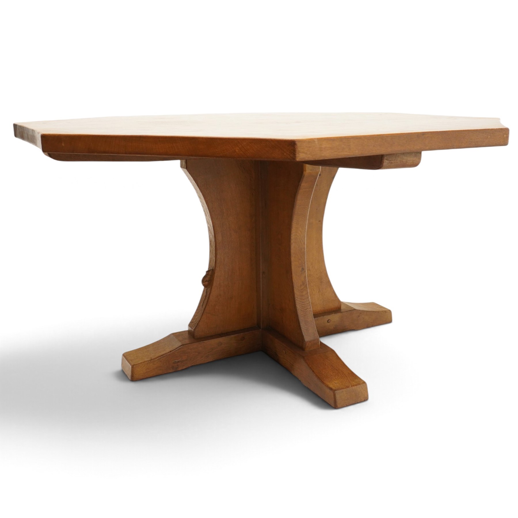 Mouseman - 1940s pre-war adzed oak octagonal dining table, the octagonal adzed top with concave sides, raised on a cruciform base with sledge feet, with carved mouse signature, by the workshop of Robert Thompson of Kilburn

Provenance: ordered directly from the Mouseman workshop in the 1940s before the outbreak of the war, the items were subsequently delivered after the end of war. 