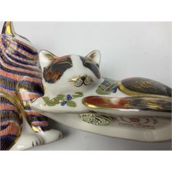 Three Royal Crown Derby cat paperweights, comprising Catnip Kitten together with two Imari examples modelled seated, two with gold stoppers, tallest H13cm