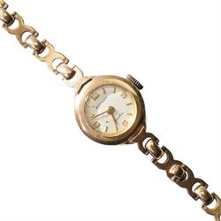 Rotary 9ct gold ladies manual wind wristwatch, on integral 9ct gold bracelet, hallmarked