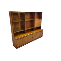 G-Plan - teak wall unit, the upper section fitted with two glazed doors, fall front compartment and shelves, the lower section fitted with two double cupboards and two drawers (W201cm, H65cm, D46cm); together with a corner shelving unit (W62cm, H165cm)