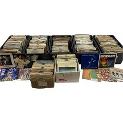 Seven boxes containing approximately eight hundred 45rpm singles, juke box singles and EPs, 1960s - 1990s including Beatles, Rolling Stones, Small Faces, Elvis Presley, The Animals, T-Rex, The Troggs, The Who, The Tremelloes, Cliff Richard and The Shadows, Queen, David Bowie, Whitesnake, Thomson Twins, Ultravox, Elton John, Phil Collins, Wham, George Michael, Blondie, Prince, Buddy Holly, Frankie Goes To Hollywood, Culture Club, Free, Donovan, Abba, Sonny and Cher, Peter Gabriel, Slade, Dusty Springfield etc; most in sleeves, some loose and some in plain card covers