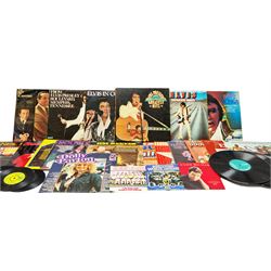 Quantity of vinyl records to include an Elvis Presley Greatest Hits box set and other records by Elvis Presley, Dolly Parton, Cliff Richard, The Nolan Sisters, and other musicians, approximately 50, in one box. 