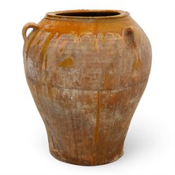 Large Spanish terracotta olive jar, of typical baluster form with drip glaze decoration and three lug handles, with impressed mark fabrica de alfareria, H58cm