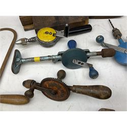 Quantity of woodworking tools, comprising hand drills to include Stanley No. 803 and No. 5803, Qualcast Clipper etc, together with collection of planes to include moulding examples and rebate plane of stepped form, and further tools including chisels etc