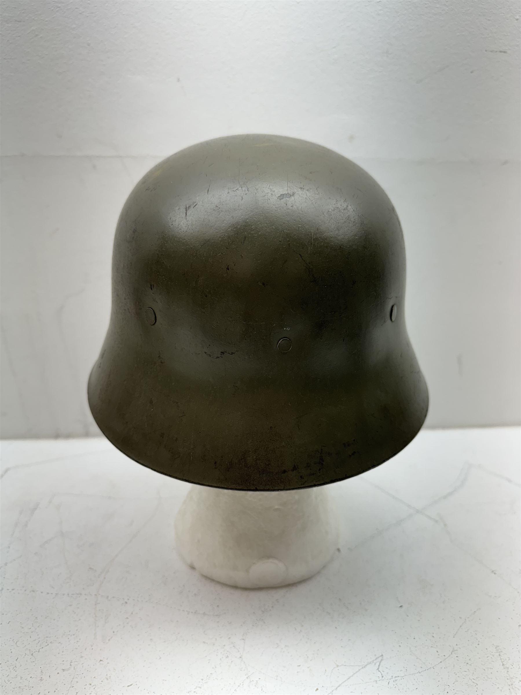 WWII Spanish combat steel helmet model Z, with leather lining and canvas strap, interior D22cm 