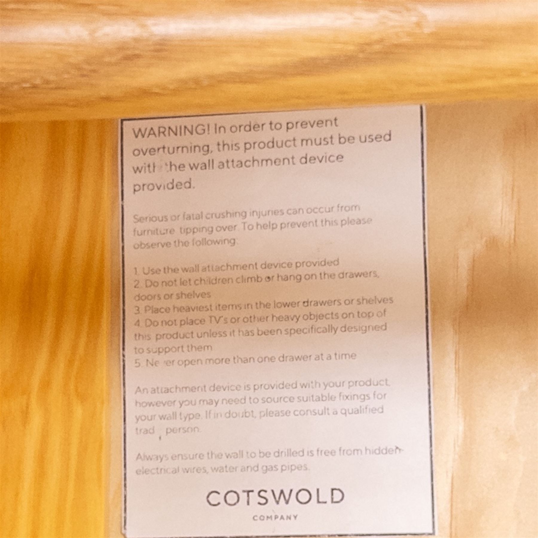 Cotswold & Co - contemporary light oak double wardrobe, plain rectangular form with twin panelled doors enclosing hanging interior, single full-width drawer below fitted with wooden knobs, on moulded plinth base