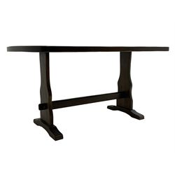 Solid oak dining table, rectangular top with curved ends, solid end supports on sledge feed joined by pegged stretcher