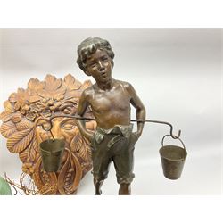 Kennedy 1964 silver half dollar, together with other American coins, bronzed figure of a young boy water carrier with yoke and brass pails, Green man wall mounted head, carved wood fish and Venetian masks etc