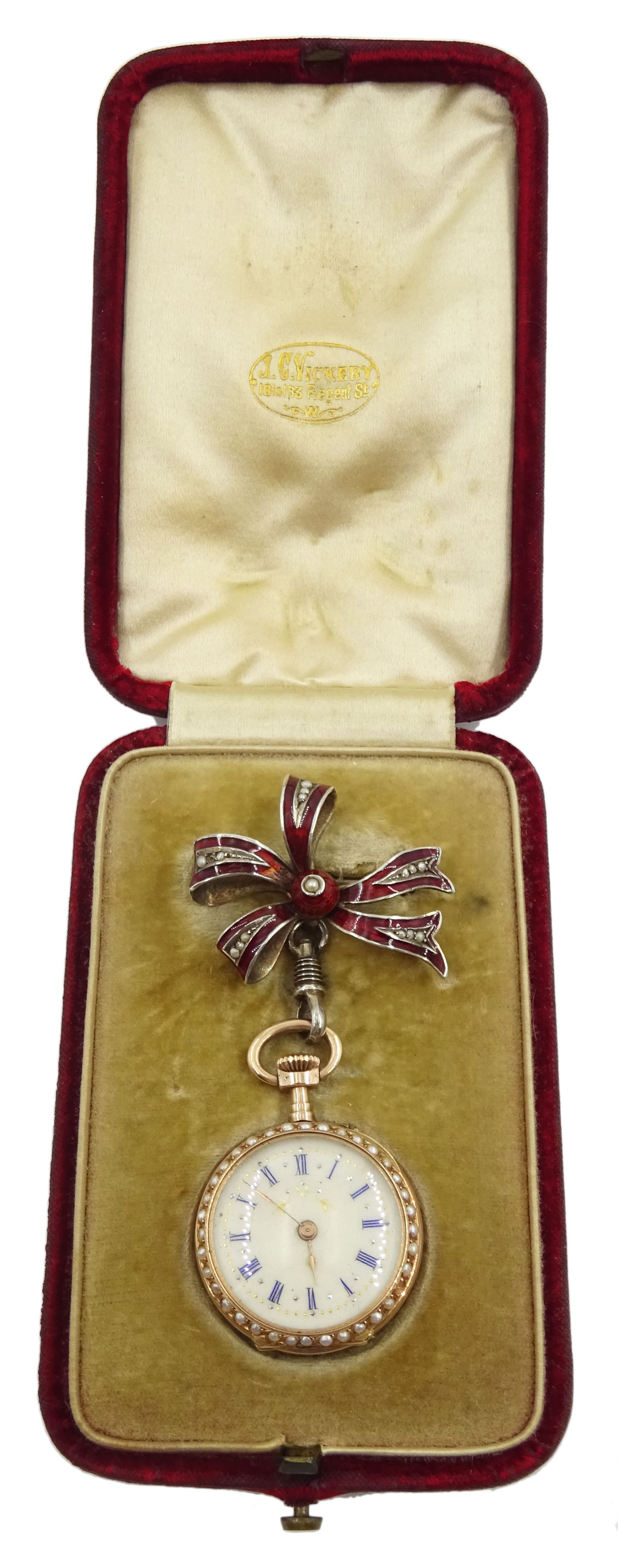Swiss 14ct gold open face keyless cylinder ladies fob watch, white enamel dial with Roman numerals, guilloche red enamel decorated with Fleur de Lys and split seed pearl surround, case No. 285674 with Swiss export hallmarks and engraved horse, with German silver red enamel and split pearl bow attachment stamped 800, in personalised silk lined case by J.C Vickery, Regent street
