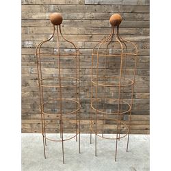 Pair of Country House wrought iron garden obelisks with ball finial, raise in four tiers