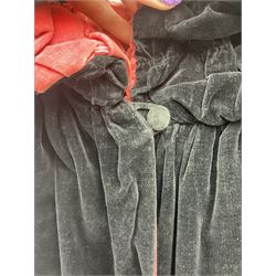 Full length 1930's childs black velvet cape, with ruched collar and red velvet lining, with a single button neck fastening 