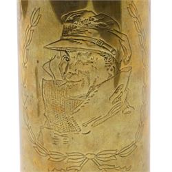 First World War trench art shell casing, decorated with crest for The Kings Own Royal Lancaster Regiment, one side decorated with detailed portrait; together with Two Victorian Brass finger plates together with a brass badger and a saussurite model of a pig